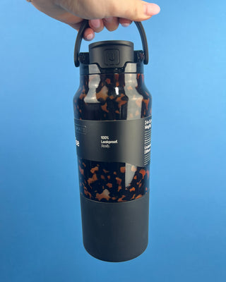 Shop the BrüMate Rise 35oz in Tortoise! This insulated, 100% leakproof water bottle features a 2-in-1 lid, carrying handle, and stylish tortoise finish.