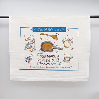 Tea towel with Gumbo 101 illustration on a white background