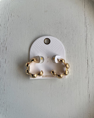 textured gold beads and a bold open-hoop design. Perfect for everyday outfits, date nights, and special occasions.