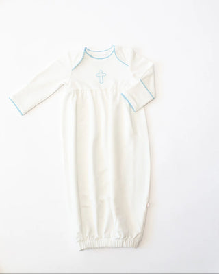 White baby gown with blue trim and cross design on a white background
