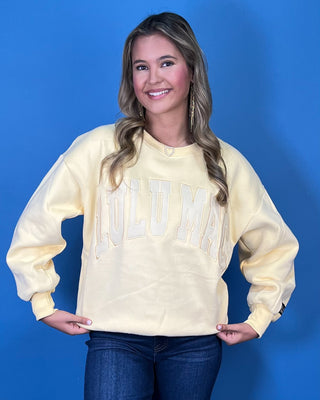Butter yellow Lulu Mac graphic crewneck sweatshirt with tonal varsity-style lettering, long sleeves, ribbed trim, and a relaxed fit.