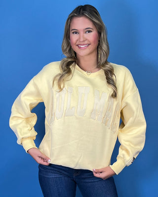 Butter yellow Lulu Mac graphic crewneck sweatshirt with tonal varsity-style lettering, long sleeves, ribbed trim, and a relaxed fit.
