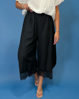 Drawstring Lace Hem Pants featuring a relaxed fit, elastic drawstring waist, and elegant lace hem