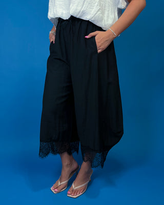 Drawstring Lace Hem Pants featuring a relaxed fit, elastic drawstring waist, and elegant lace hem