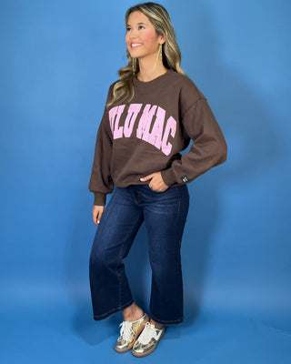 Chocolate brown Lulu Mac graphic crewneck sweatshirt with bold pink varsity lettering, long sleeves, ribbed trim, and a relaxed fit.