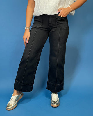 HR Pintuck Crop Wide Leg Jeans featuring a flattering high-rise fit, pintuck front seams, cropped wide leg silhouette, and stretch denim.