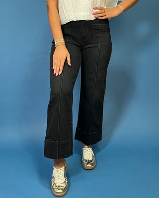 HR Pintuck Crop Wide Leg Jeans featuring a flattering high-rise fit, pintuck front seams, cropped wide leg silhouette, and stretch denim.