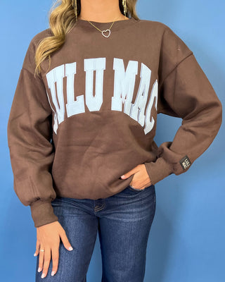 Chocolate brown Lulu Mac graphic crewneck sweatshirt with light blue varsity lettering, long sleeves, ribbed trim, and a relaxed fit.