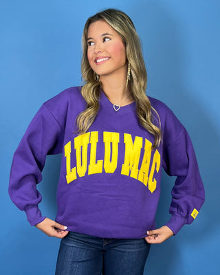 Purple Lulu Mac graphic crewneck sweatshirt with bold gold varsity lettering, long sleeves, ribbed trim, and a relaxed fit.