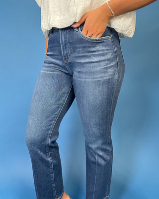 HR Dark Wash Straight Ankle Jeans featuring a flattering high-rise fit, straight ankle leg