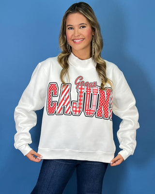 White Geaux Cajuns graphic sweatshirt with bold red mixed-print lettering, mock neckline, long sleeves, and a relaxed fit.