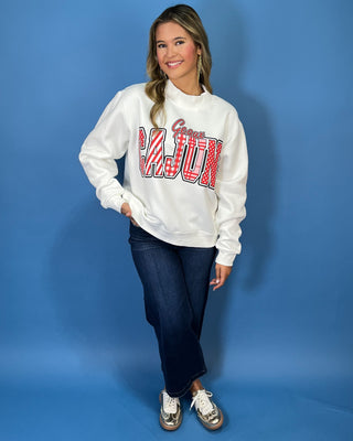 White Geaux Cajuns graphic sweatshirt with bold red mixed-print lettering, mock neckline, long sleeves, and a relaxed fit.