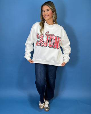 White Geaux Cajuns graphic sweatshirt with bold red mixed-print lettering, mock neckline, long sleeves, and a relaxed fit.