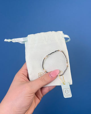 Shop the Hope Purpose Pearl Moonlight Bracelet by enewton, featuring delicate gray beads, white pearl accents, and gold details for timeless everyday style.