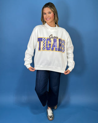 White Geaux Tigers graphic sweatshirt with bold purple mixed-print lettering, gold accents, mock neckline, long sleeves, and a relaxed fit.