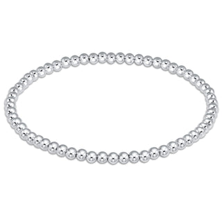 Silver beaded bracelet on a white background