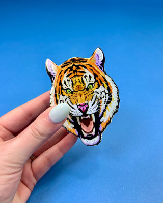 Oversized tiger head claw hair clip featuring a roaring tiger design with durable spring hinge and secure grip for game day hairstyles.