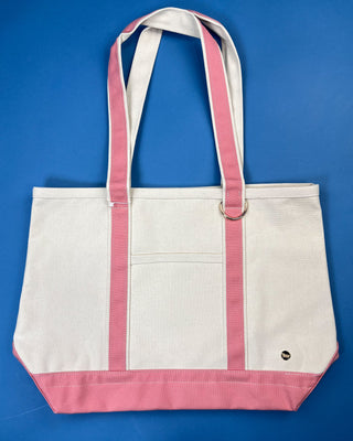 Large heavyweight canvas tote bag with contrast trim, reinforced shoulder straps, exterior slip pocket, and spacious interior available in multiple colors.