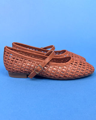 A pair of woven brown leather Mary Jane flats