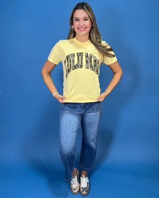 a pale yellow t-shirt with 'LULU MAC' printed in camo across the chest