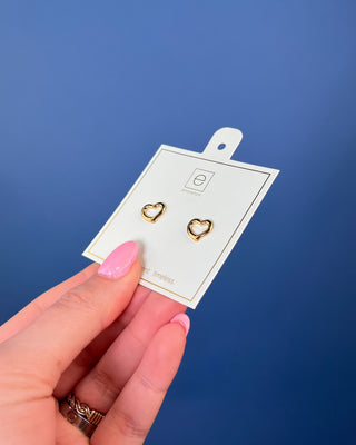 Enewton Gold Love Stud Earrings featuring polished open heart 14kt gold-filled studs displayed on an Enewton jewelry card.