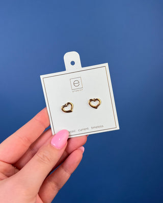 Enewton Gold Love Stud Earrings featuring polished open heart 14kt gold-filled studs displayed on an Enewton jewelry card.