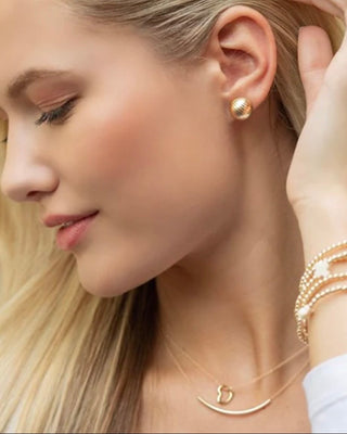 Enewton Gold Open Heart Charm Necklace featuring a polished open heart pendant on a delicate 16-inch gold chain displayed on