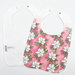 Floral-patterned bib on a white background