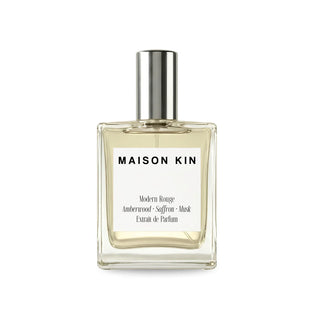 Maison Kin perfume bottle on a white background