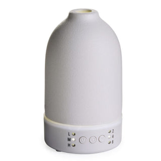White textured diffuser with control panel on a white background
