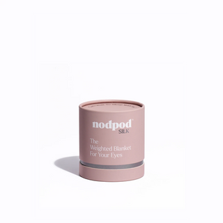 Pink cylindrical container labeled 'nodpod' on a white background