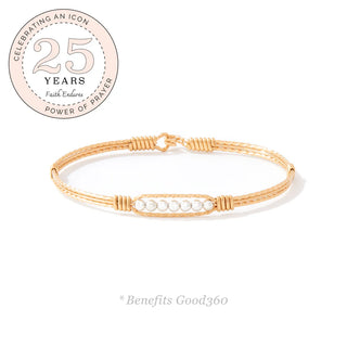 Rose gold bracelet with three pearl-like stones on a white background, featuring a '25 Years' icon.