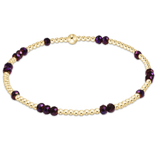 Shop the Enewton Gameday Flirty Hope Unwritten Purple Bracelet featuring polished gold beads and sparkling purple accents. Perfect for game day and everyday!
