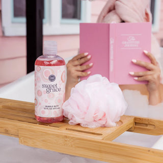 Shop the Sweet Grace Bubble Bath 16 oz by Bridgewater Candle Company. Enjoy a relaxing bath with notes of passion fruit, sparkling tea, and patchouli.