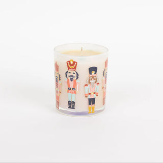 Candle with nutcracker design on a white background