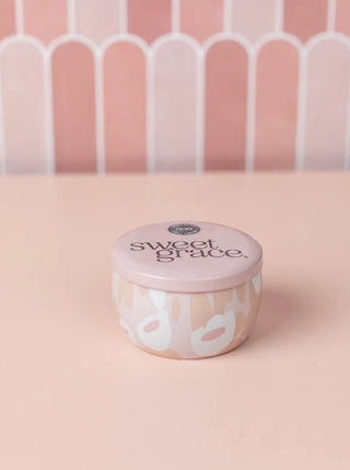 Pink container with 'sweet grace' text on a pink background