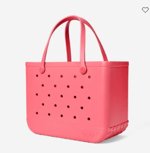 Pink tote bag with perforated design on a white background