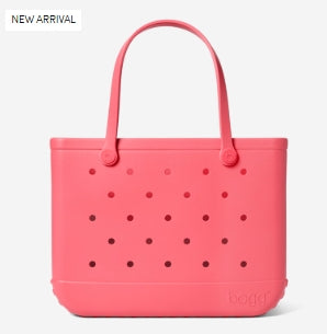 Pink tote bag with black polka dots on a white background