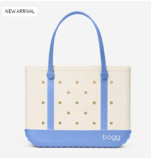 White tote bag with blue accents and gold polka dots, featuring the brand 'bogg'.