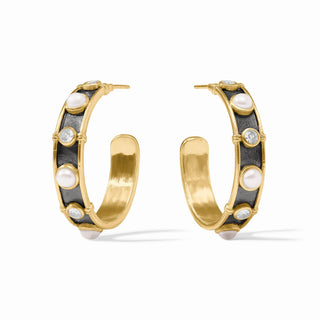 Gold hoop earrings with black accents and pearls on a white background