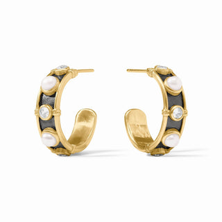 Gold hoop earrings with black accents and pearl-like stones on a white background