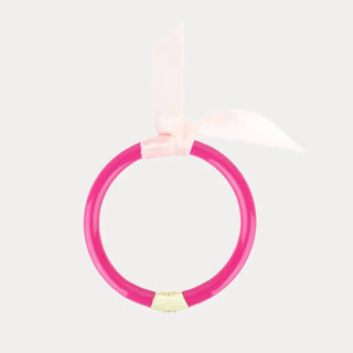 Pink and gold hoop on a white background
