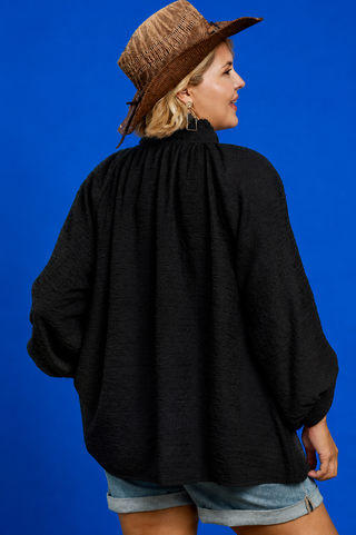 Blue Button Up Tiered Denim Top in soft 100% Tencel with a button front, chest pocket, tiered peplum hem, and relaxed fit.