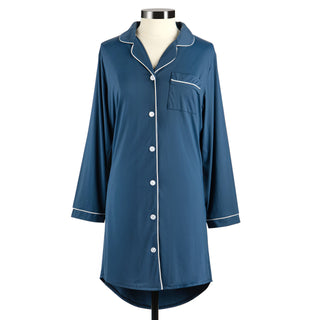 Blue nightshirt with white buttons and trim on a mannequin against a white background