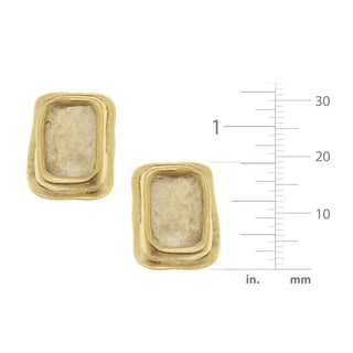Gold earrings with a textured design on a white background with measurement scale.