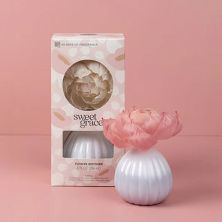 Shop the Sweet Grace Flower Diffuser by Bridgewater Candle Company. Enjoy up to 60 days of fragrance with a beautiful flower that turns pink.