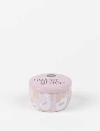 Small container with 'sweet grace' text on a white background