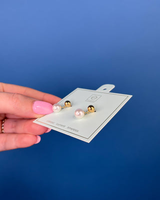 eNewton Classic 8mm Ball Drop Stud Pearl Earrings in classic gold featuring polished 8mm gold ball studs with elegant pearl drop accents and secure post backs displayed on an eNewton jewelry card.