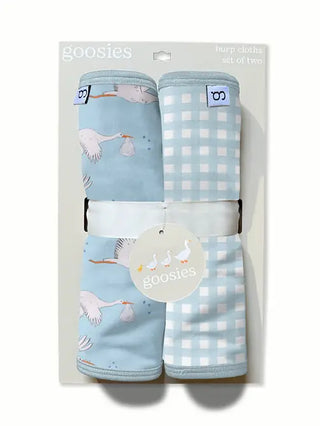 Packaged baby burp cloths with stork design and checkered pattern on a white background