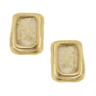 Pair of gold earrings with layered design on a white background